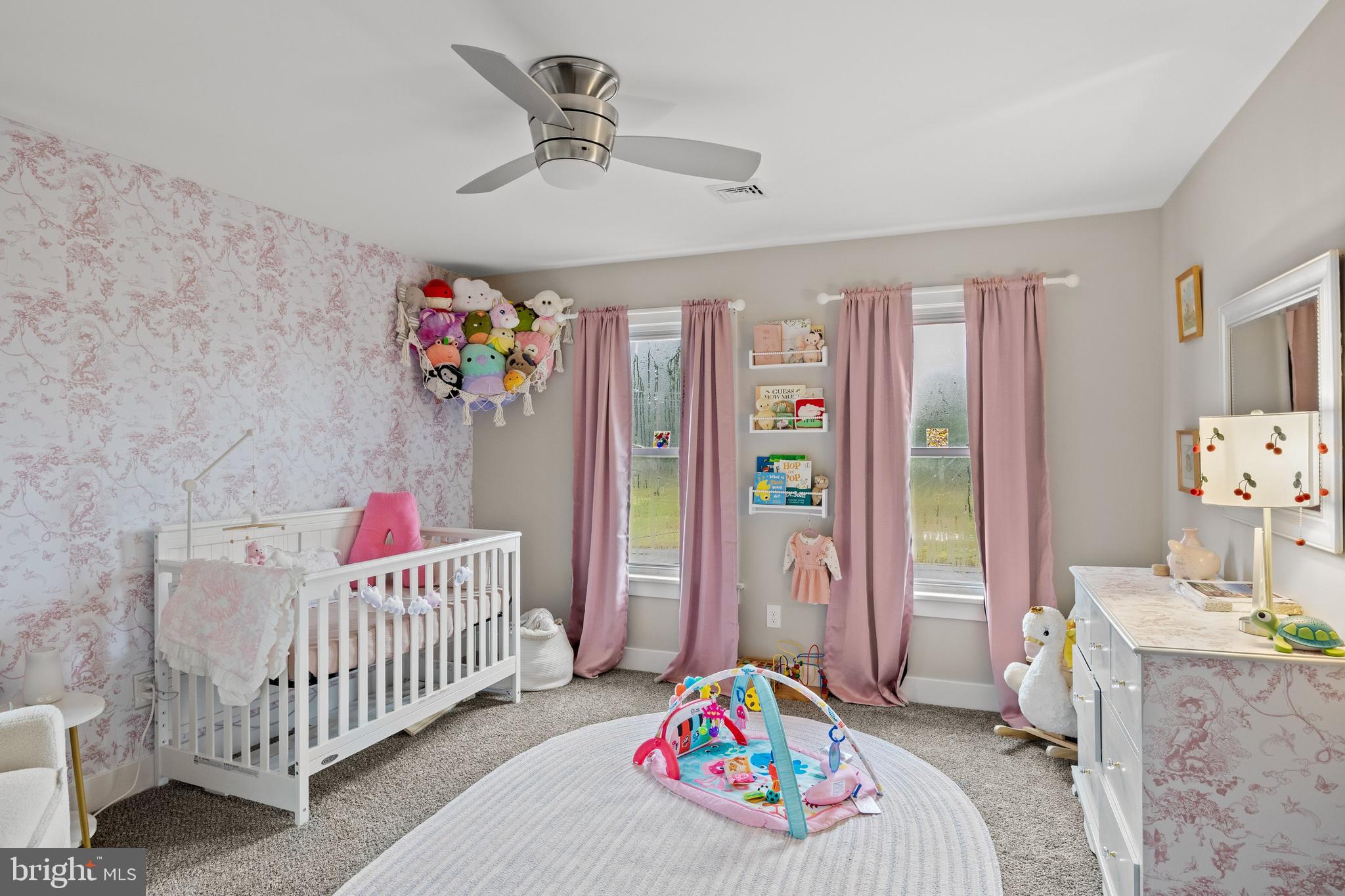 218 Pleasant Mills Road Hammonton, NJ 08037 - Photo 25 of 36 a bedroom with furniture a baby crib and a chandelier