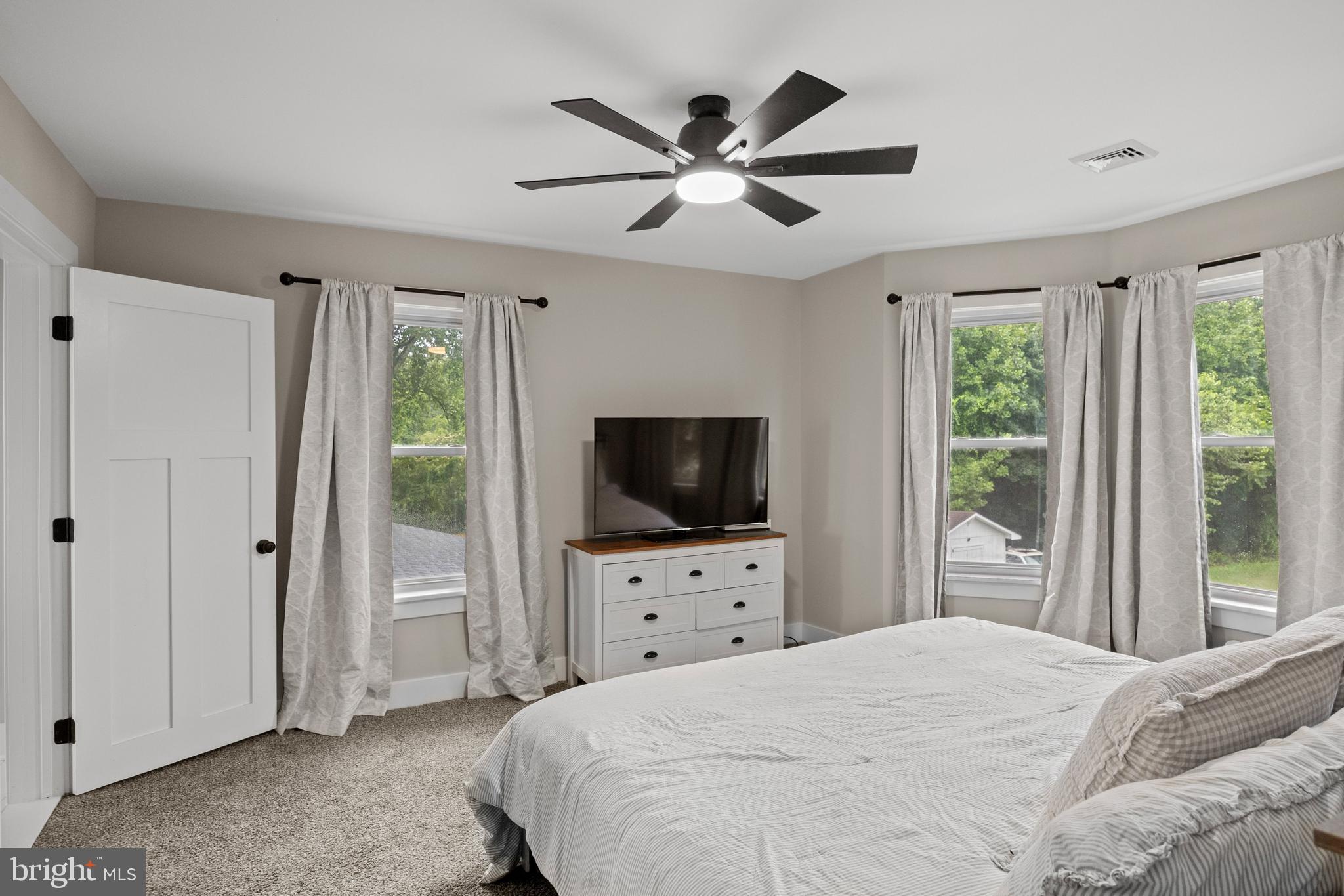 218 Pleasant Mills Road Hammonton, NJ 08037 - Photo 26 of 36 a bedroom with a bed and a flat screen tv