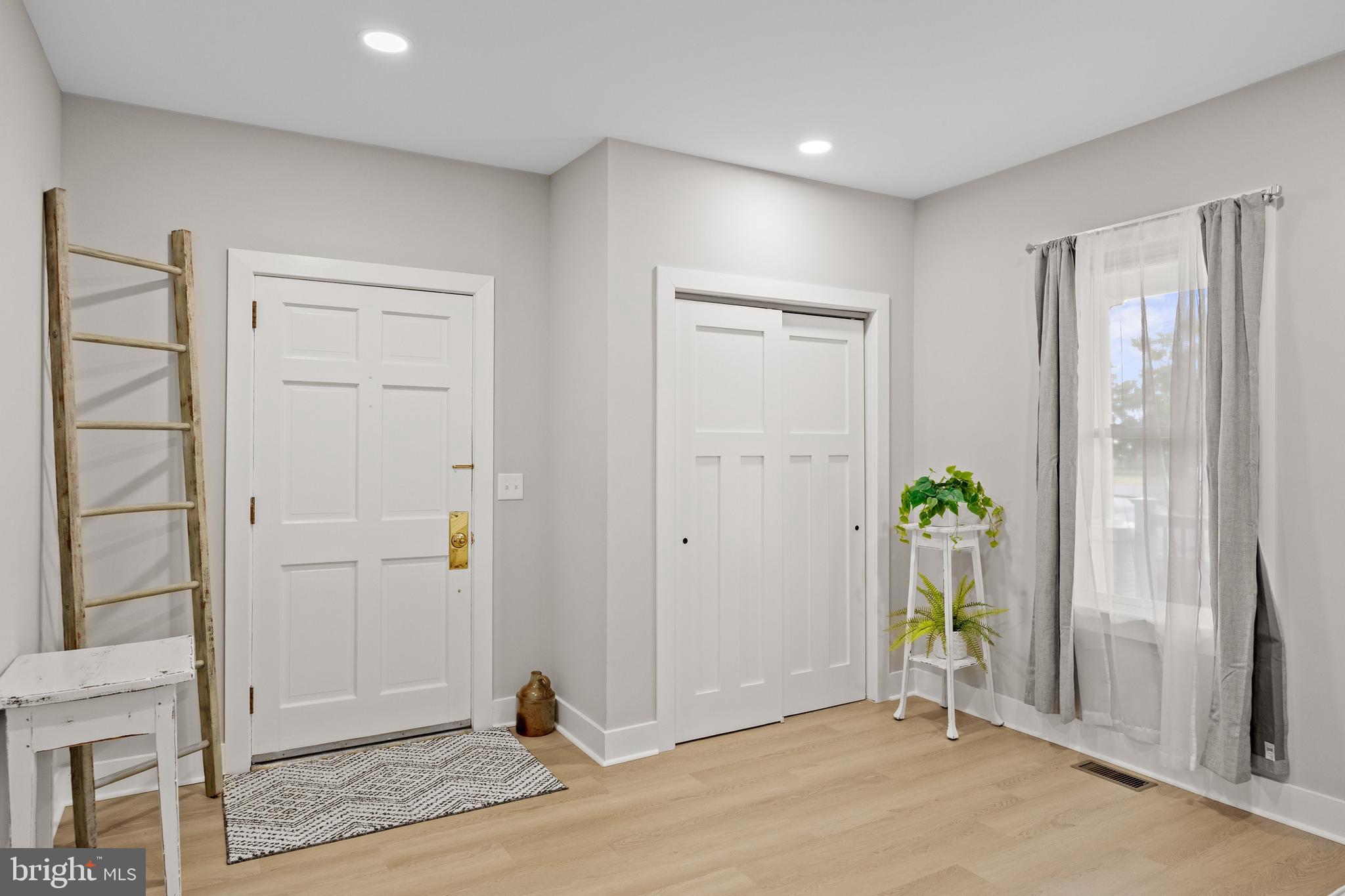 218 Pleasant Mills Road Hammonton, NJ 08037 - Photo 5 of 36 a view of an empty room and wooden floor