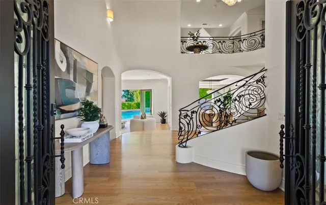 a view of a living room and entryway