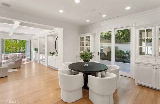 a living room with fireplace furniture and a flat screen tv