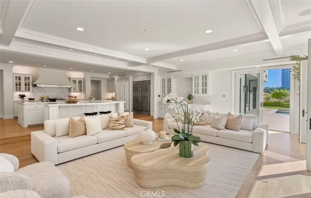 a view of a patio with table and chairs and potted plants