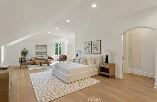 an aerial view of residential building and lake