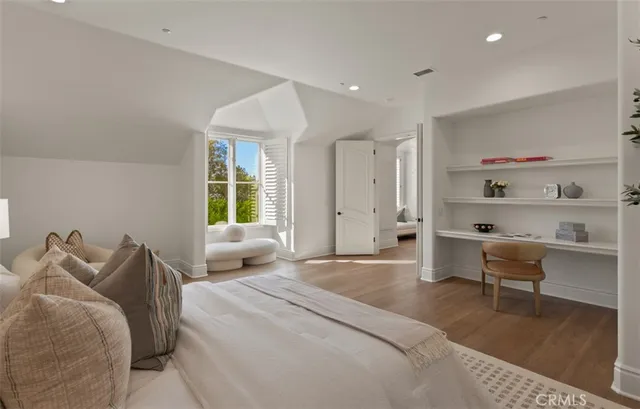 an aerial view of residential house with outdoor space and swimming pool