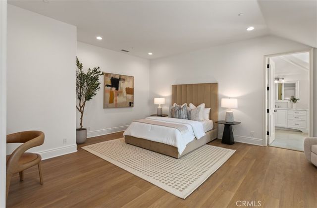 an aerial view of a house with a swimming pool