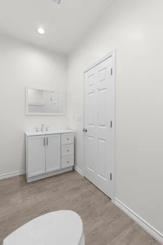 a view of small space with wooden floor