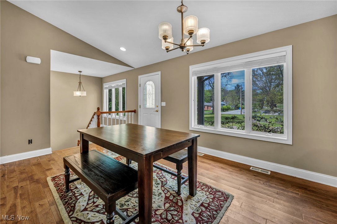 800 Bell Road Chagrin Falls, OH 44022 - Photo 6 of 35 Dining area with lofted ceiling, baseboards, light wood-style flooring, a chandelier, and recessed lighting