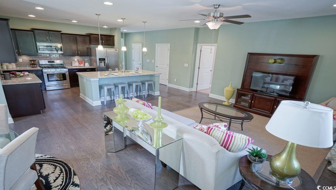 708 Rupert Drive Conway, SC 29526 - Photo 16 of 35 Living area featuring dark wood-type flooring, ceiling fan, recessed lighting, and baseboards