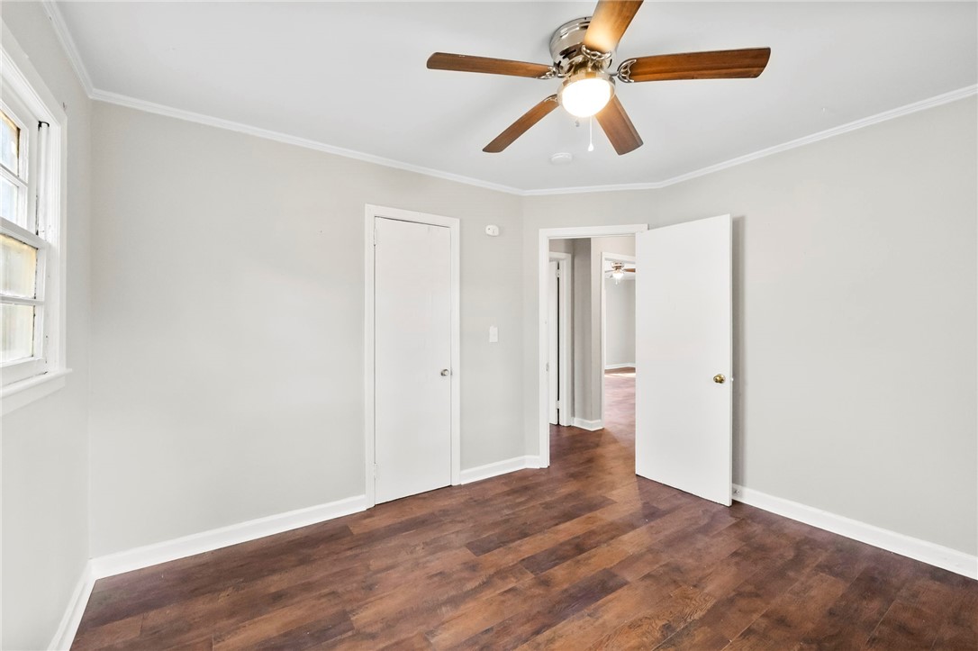 825 Dora Drive Anderson, SC 29624 - Photo 23 of 27 This bright room features a ceiling fan, a window, and durable flooring for comfortable living.