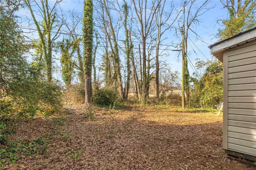 825 Dora Drive Anderson, SC 29624 - Photo 27 of 27 This spacious yard offers ample outdoor potential for your future property vision.