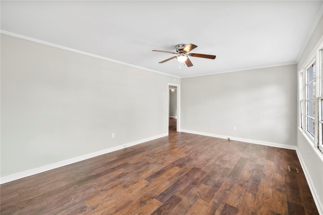 825 Dora Drive Anderson, SC 29624 - Photo 4 of 27 Bright and open living space with rich wood floors and ample natural light.