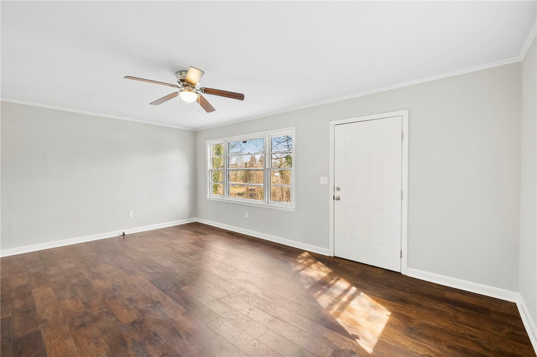 825 Dora Drive Anderson, SC 29624 - Photo 7 of 27 This bright room features a timeless hardwood floor and abundant natural light.