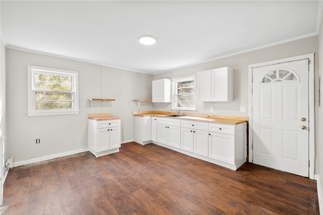 825 Dora Drive Anderson, SC 29624 - Photo 10 of 27 This spacious kitchen offers ample cabinetry and beautiful flooring, ready for your personal touch.