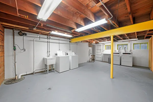 a view of street with parked cars