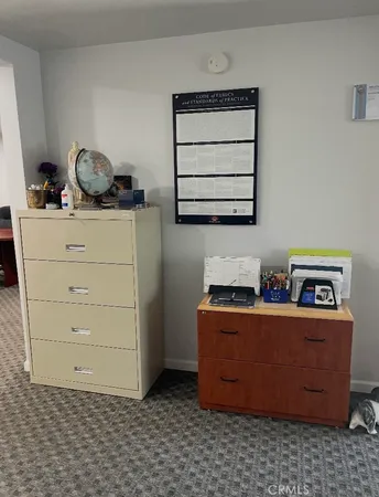 a room with storage cabinet and utility