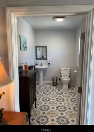 a bathroom with a sink and a toilet