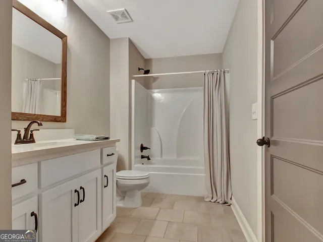 a view of a hallway with workspace