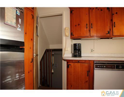 8 Wilshire Road Edison, NJ 08817 - Photo 16 of 25 a view of a kitchen with wooden floor