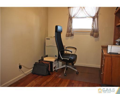 8 Wilshire Road Edison, NJ 08817 - Photo 18 of 25 a room with furniture and a window