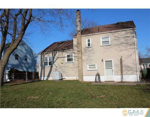 8 Wilshire Road Edison, NJ 08817 - Photo 20 of 25 a view of a house with a yard
