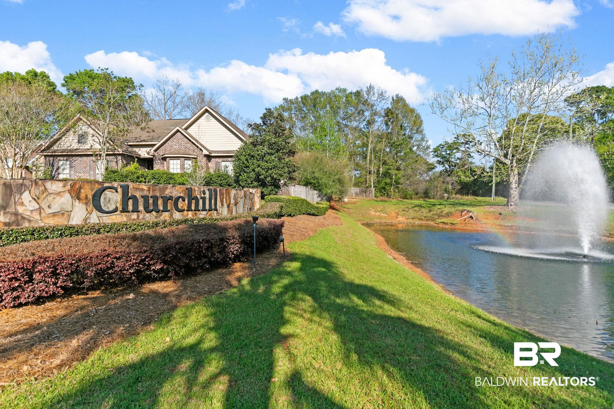 32234 Calder Court Daphne, AL 36527 - Photo 32 of 32 Community / neighborhood sign with a lawn and a water view