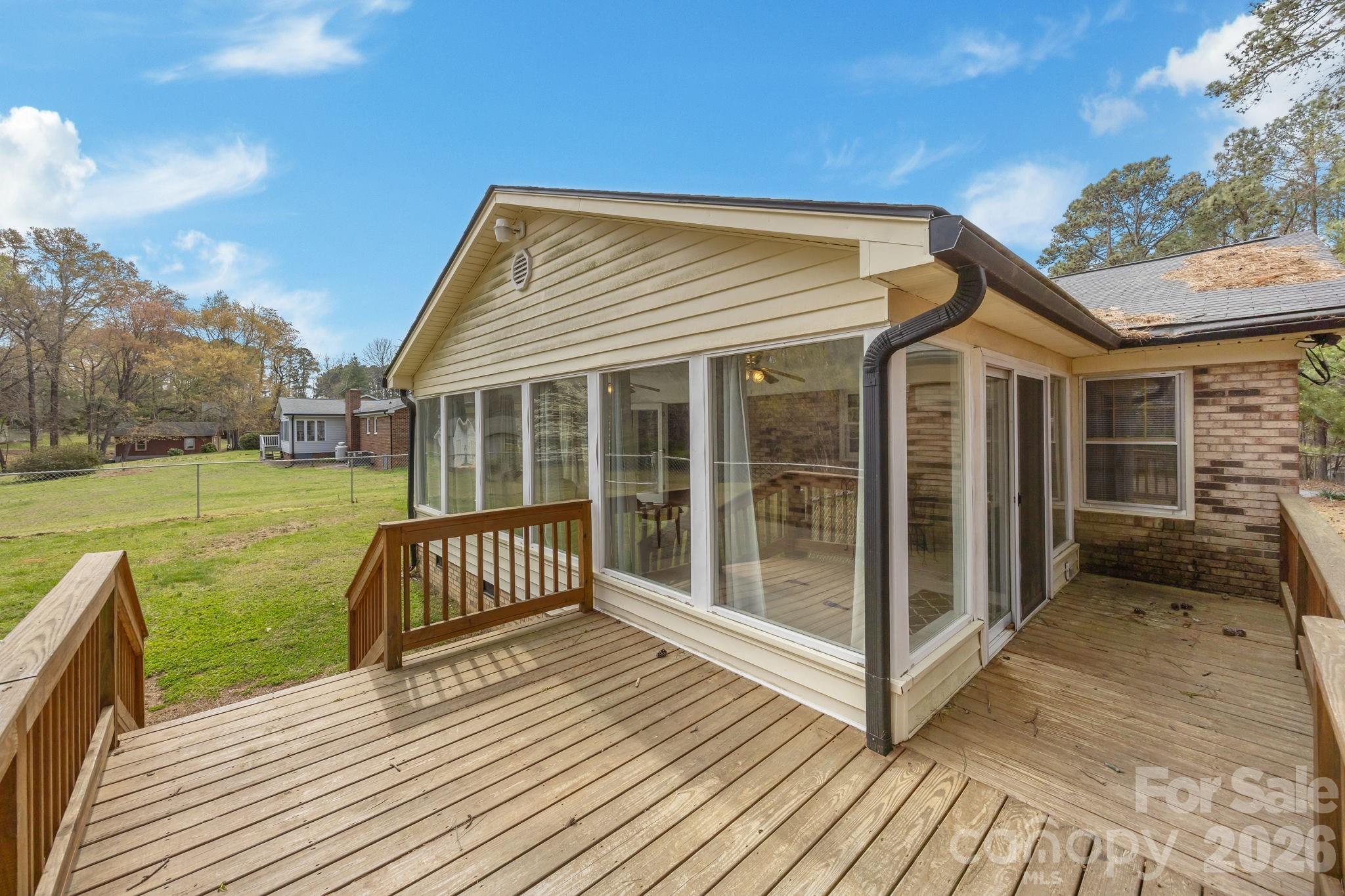 9698 Pine Tree Road, Unit 55 Norwood, NC 28128 - Photo 25 of 29 a view of a house with a yard