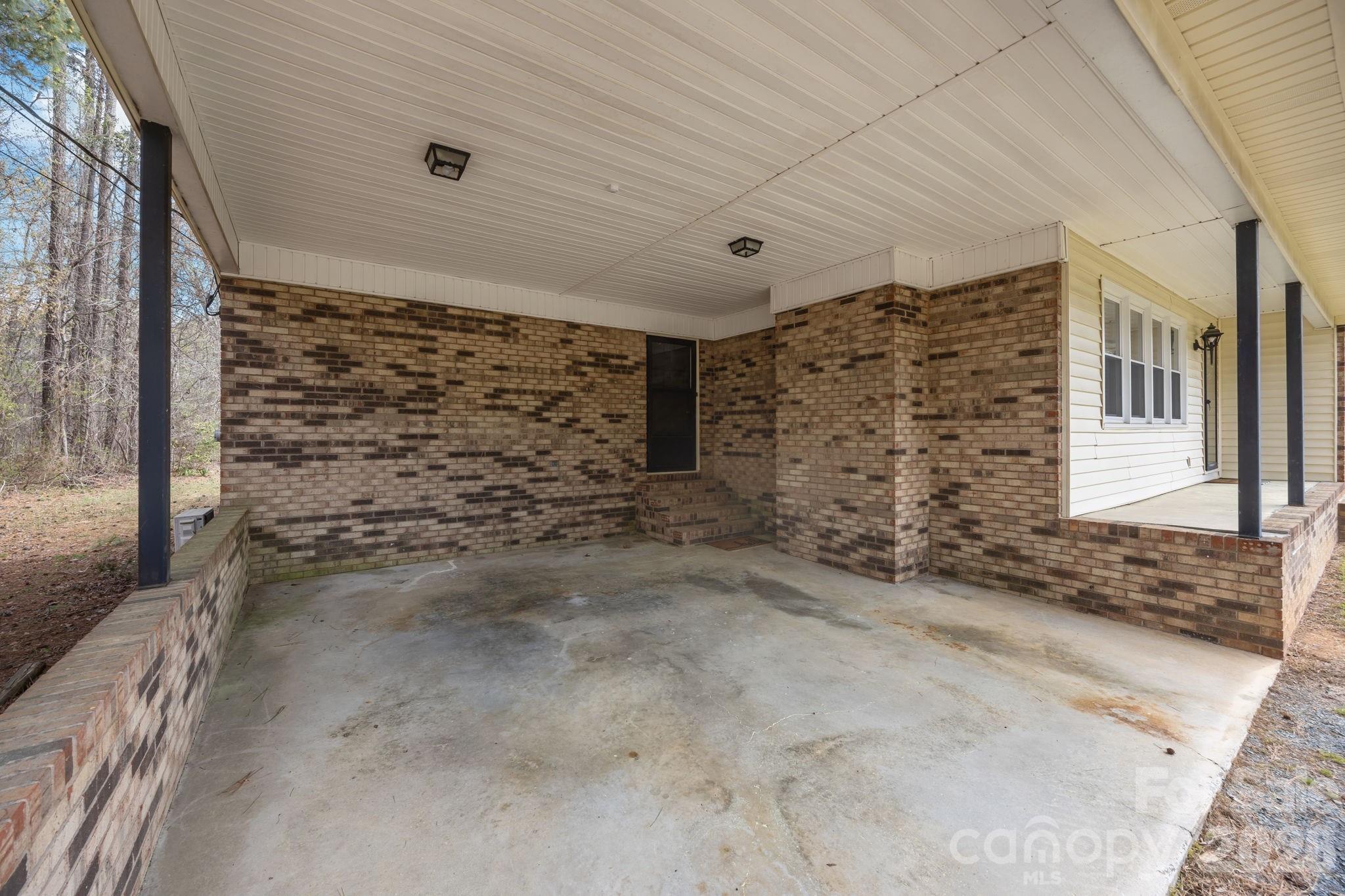 9698 Pine Tree Road, Unit 55 Norwood, NC 28128 - Photo 29 of 29 a view of a brick wall