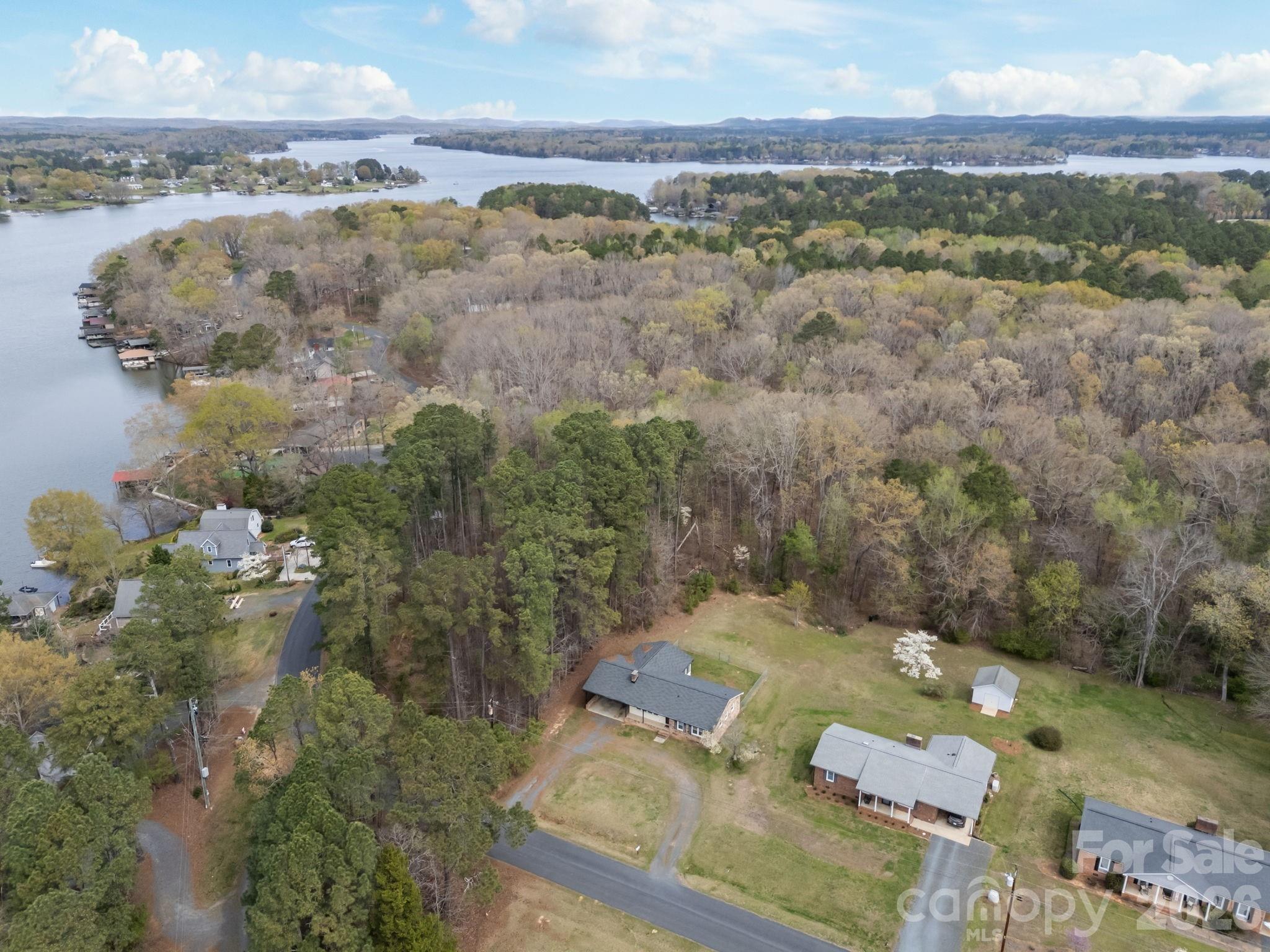 9698 Pine Tree Road, Unit 55 Norwood, NC 28128 - Photo 3 of 29 an aerial view of a house with a yard