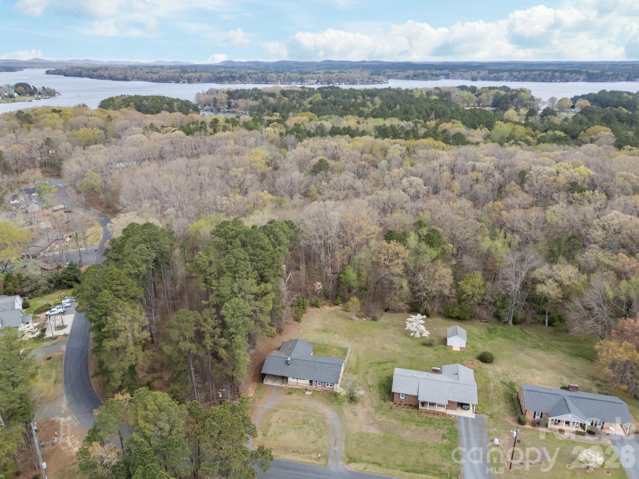 9698 Pine Tree Road, Unit 55 Norwood, NC 28128 - Photo 6 of 29 an aerial view of a residential houses with outdoor space