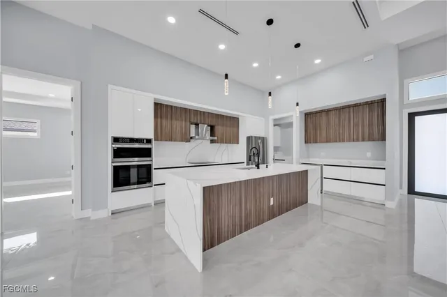 $825,000 | 129 Southwest 33rd Place, Cape Coral, FL 33991