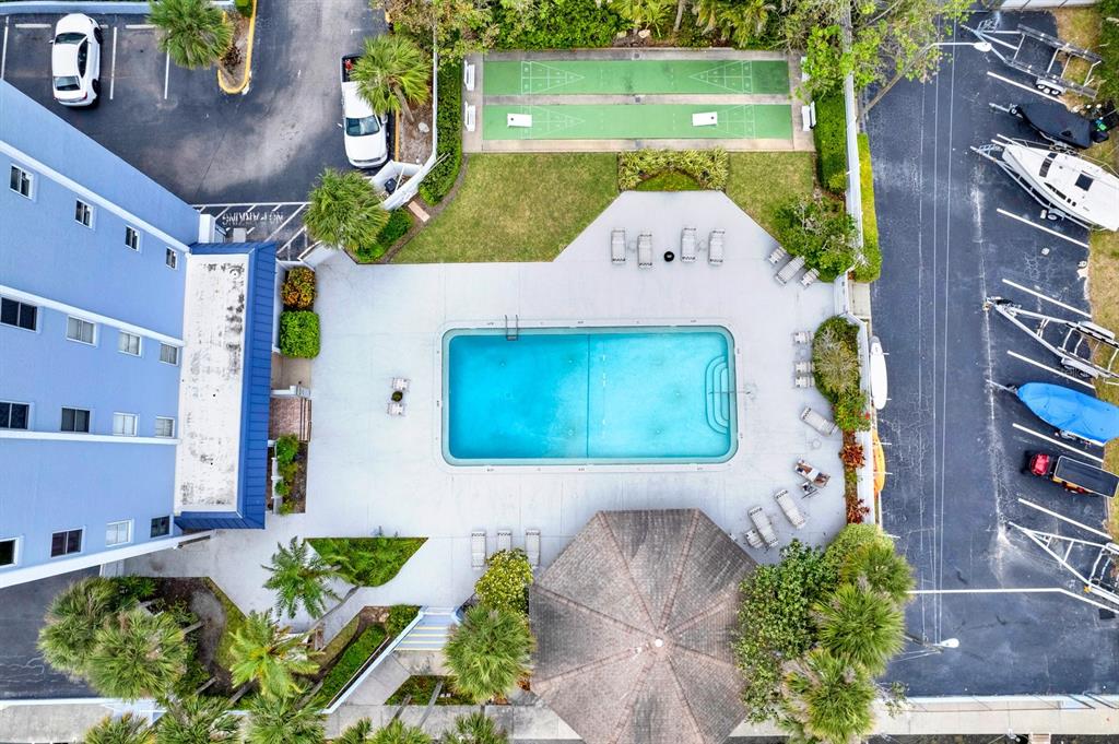 4939 Floramar Terrace, Unit 204 New Port Richey, FL 34652 - Photo 5 of 22 an aerial view of a house