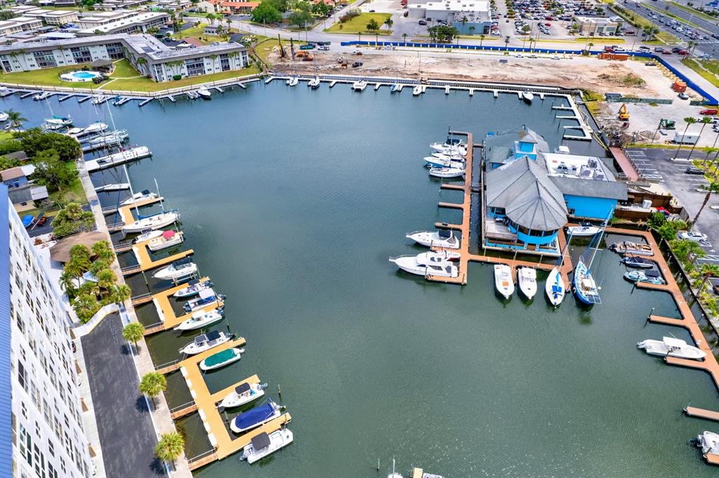 4939 Floramar Terrace, Unit 204 New Port Richey, FL 34652 - Photo 7 of 22 an aerial view of a house with wooden floor portable swimming pool and outdoor seating