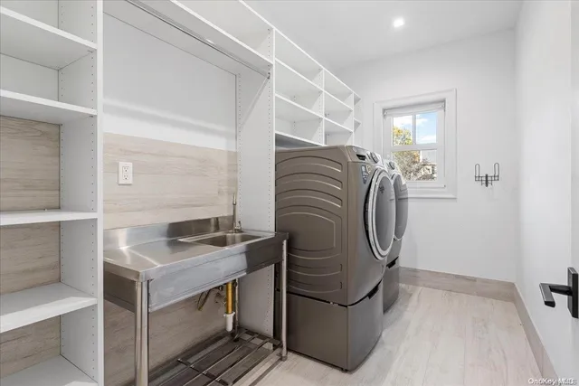 a utility room with cabinets