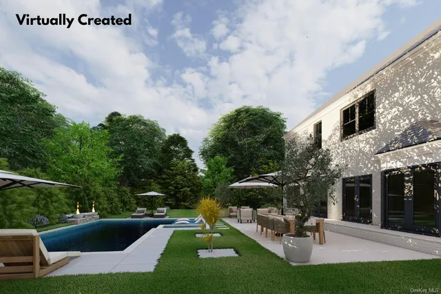 a view of a house with backyard sitting area and garden