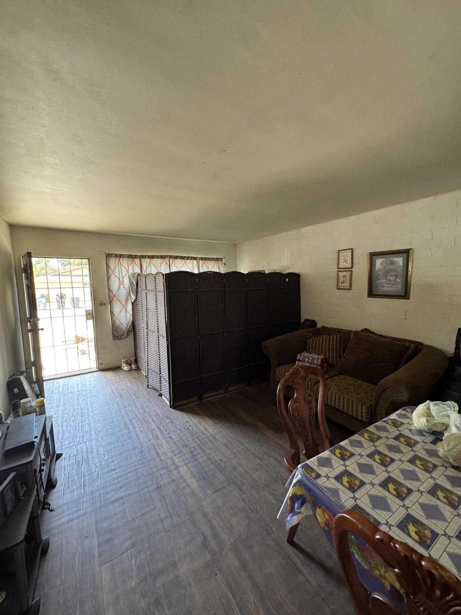 704 North Floral Street Visalia, CA 93291 - Photo 35 of 51 a bedroom with furniture and a window