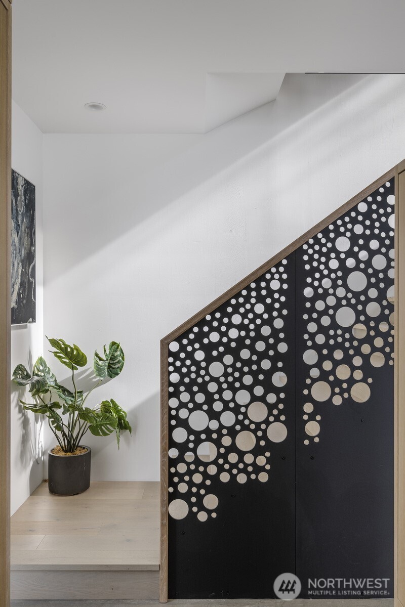 4869 Mercer Road Bow, WA 98232 - Photo 12 of 34 a white vase with flowers