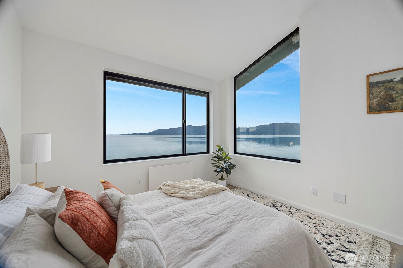 4869 Mercer Road Bow, WA 98232 - Photo 16 of 34 a bedroom with a bed and a window