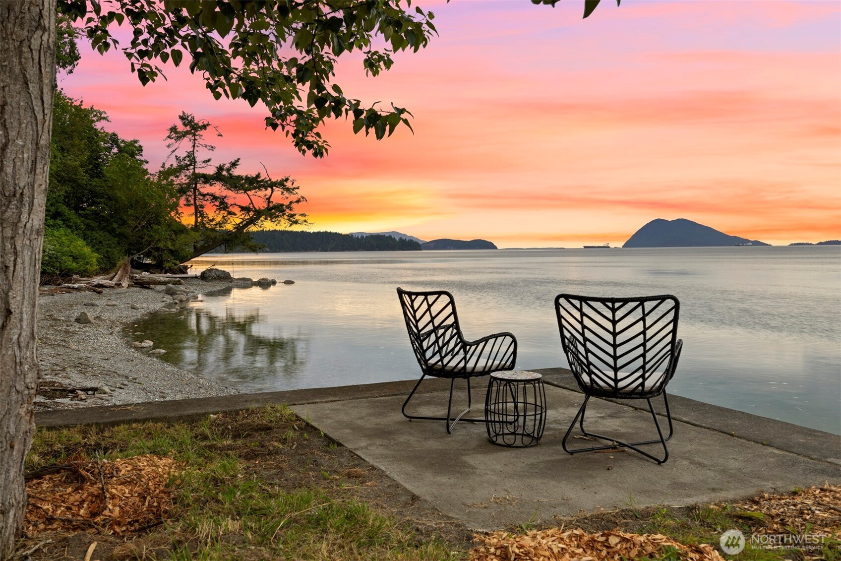 4869 Mercer Road Bow, WA 98232 - Photo 2 of 34 a view of a chairs and table in the patio