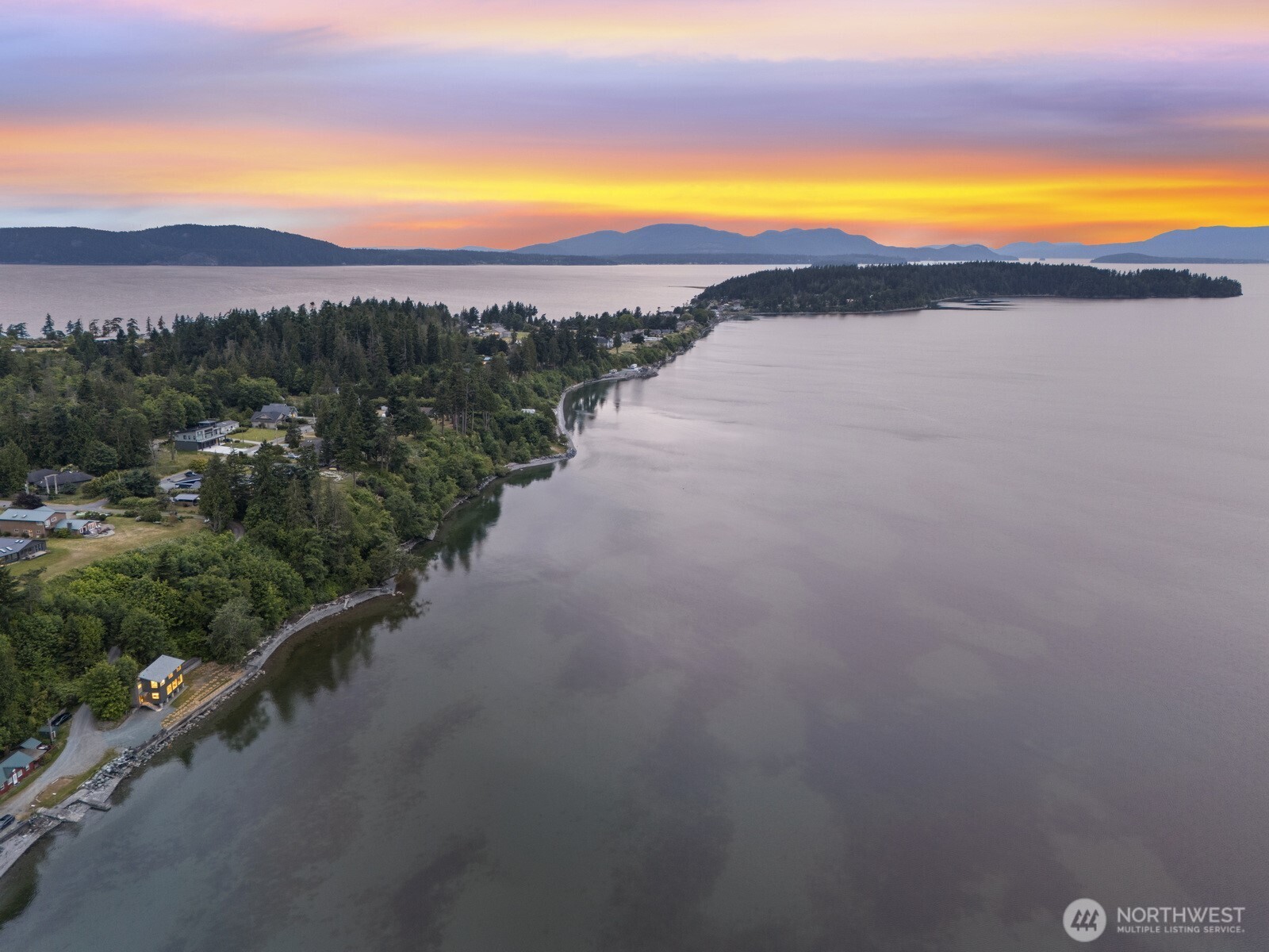 4869 Mercer Road Bow, WA 98232 - Photo 28 of 34 a view of a lake with sunset