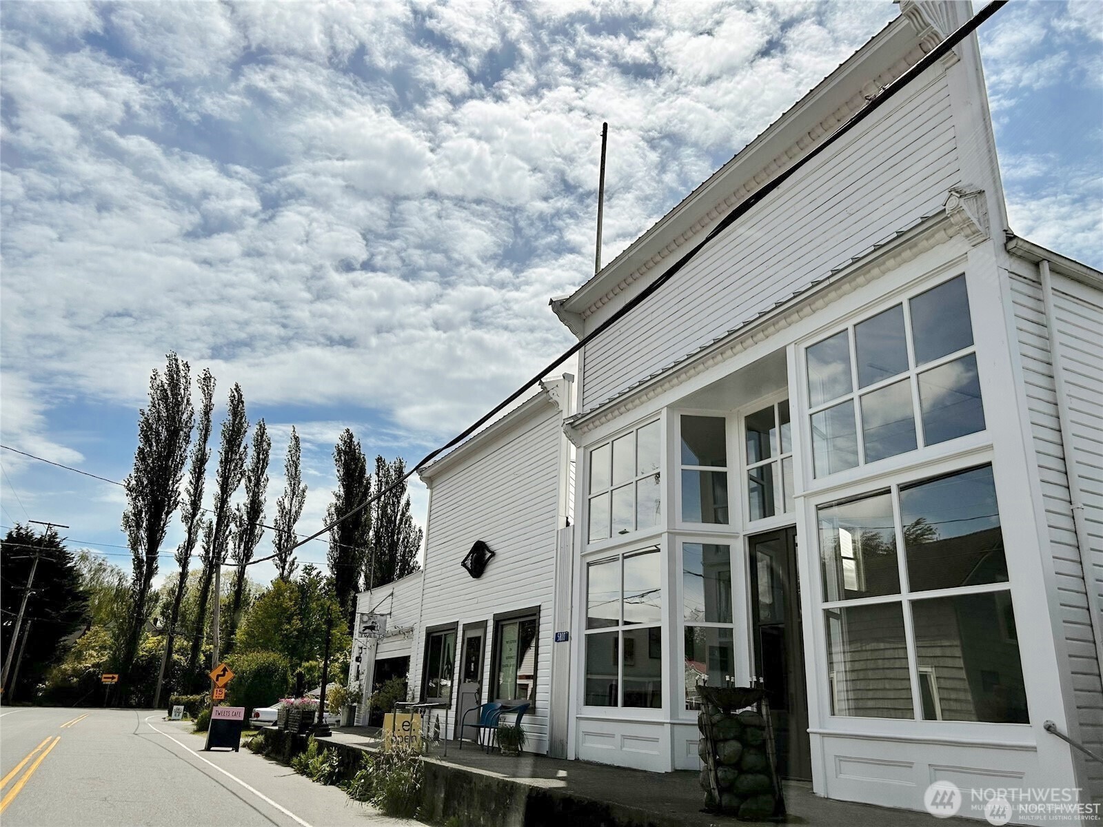 4869 Mercer Road Bow, WA 98232 - Photo 30 of 34 a front view of a building with street view