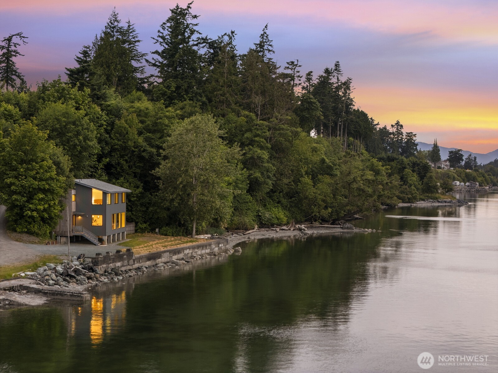 4869 Mercer Road Bow, WA 98232 - Photo 3 of 34 a view of a lake with houses