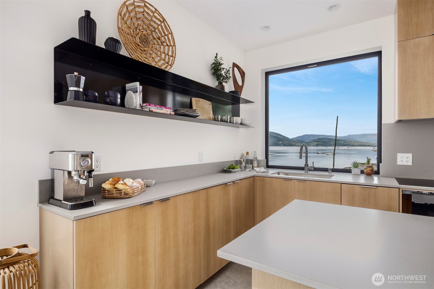 4869 Mercer Road Bow, WA 98232 - Photo 10 of 34 a kitchen with a sink a stove and cabinets