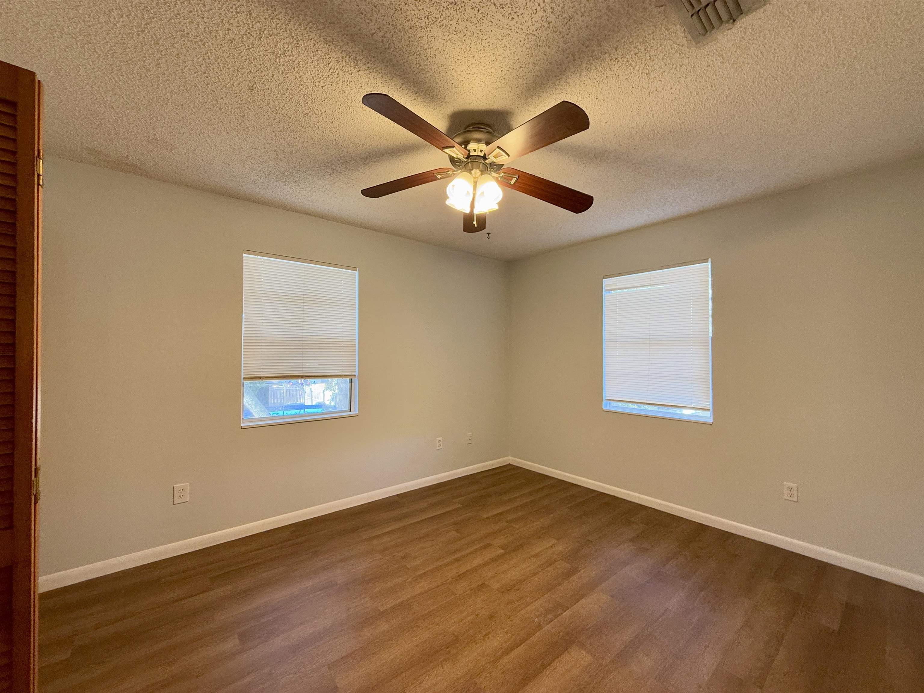 24 Atlantic Oaks Circle St. Augustine, FL 32080 - Photo 9 of 10 a view of a livingroom with a window and wooden floor