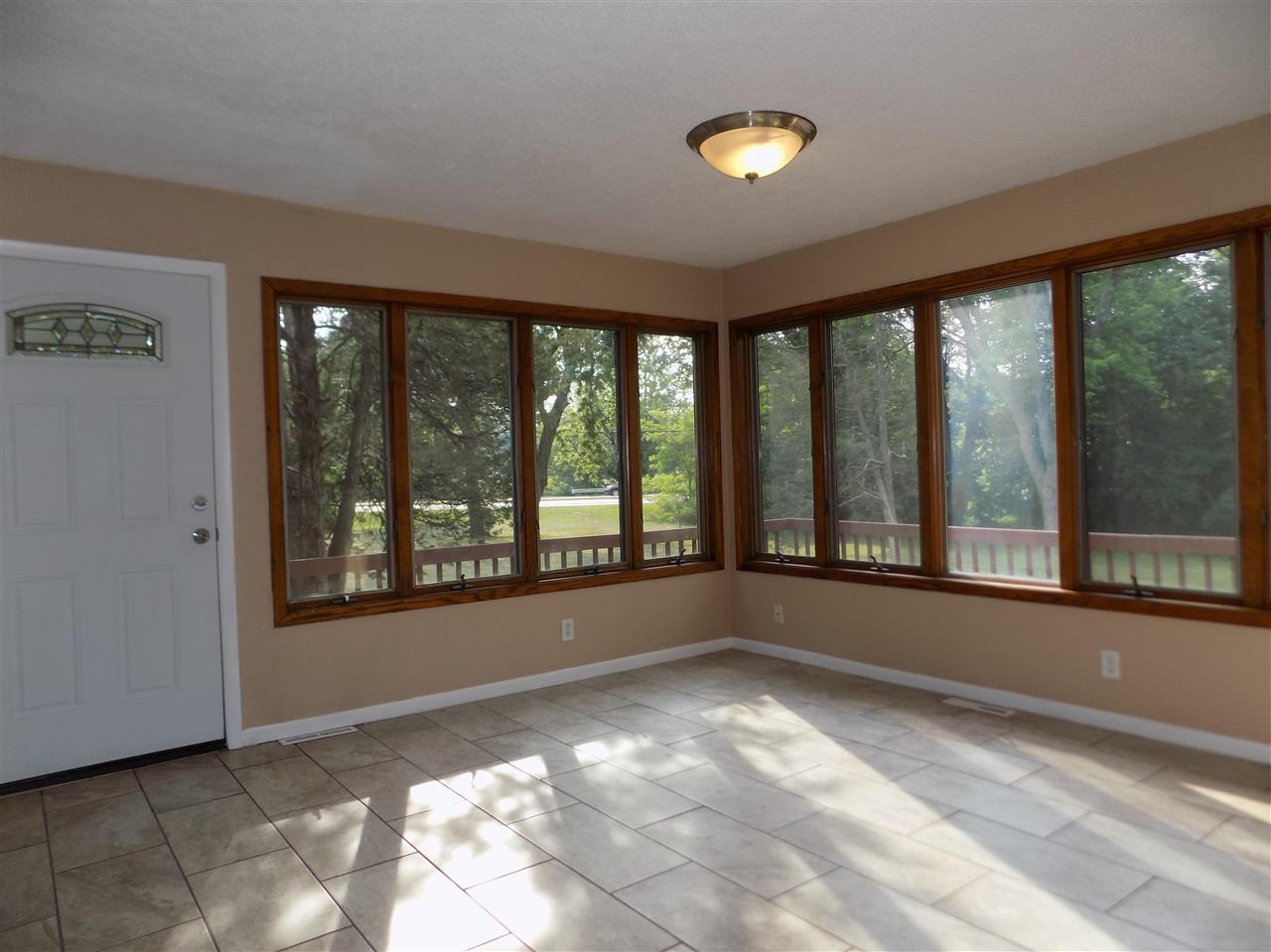 4315 Spring Creek Road Rockford, IL 61107 - Photo 15 of 39 a view of an empty room with a window