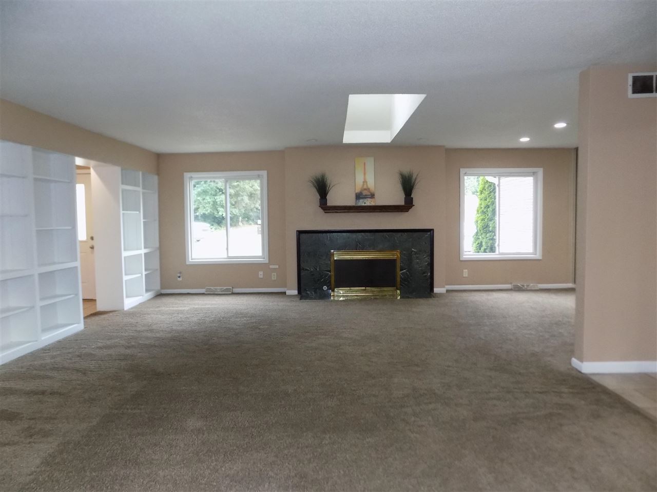 4315 Spring Creek Road Rockford, IL 61107 - Photo 5 of 39 a view of empty room with a fireplace