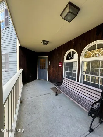 a view of entryway with a front door