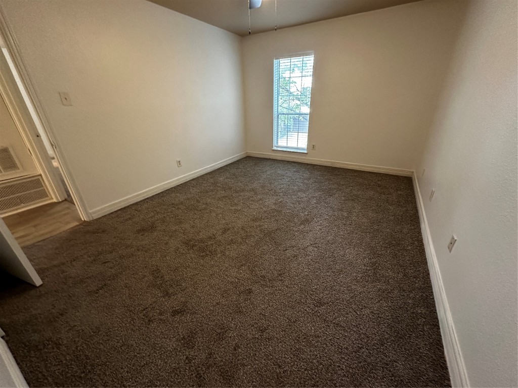 1909 Brun Street, Unit 9 Houston, TX 77019 - Photo 13 of 19 an empty room with windows