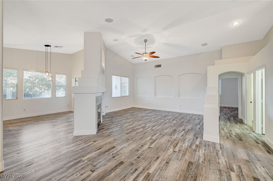 1335 Rolling Sunset Street Henderson, NV 89052 - Photo 19 of 72 Unfurnished living room with a ceiling fan, light