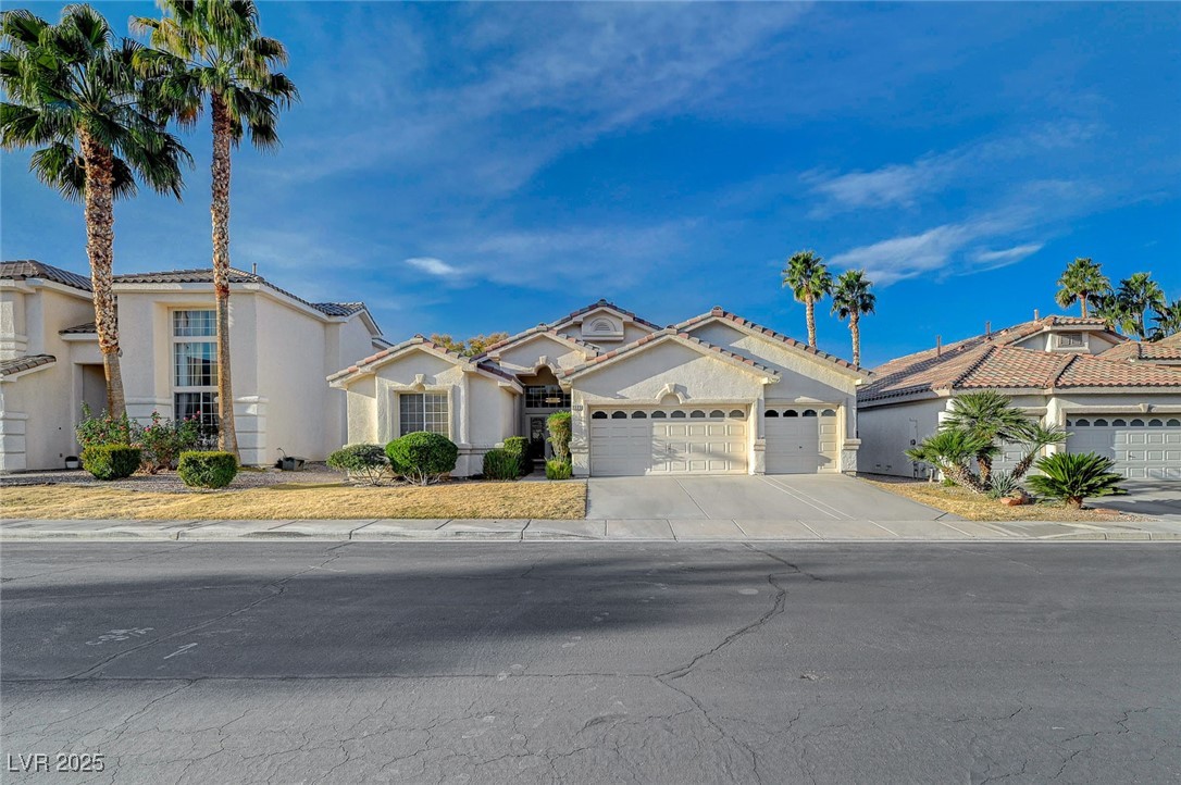 1335 Rolling Sunset Street Henderson, NV 89052 - Photo 2 of 72 Mediterranean / spanish home featuring a tile roof