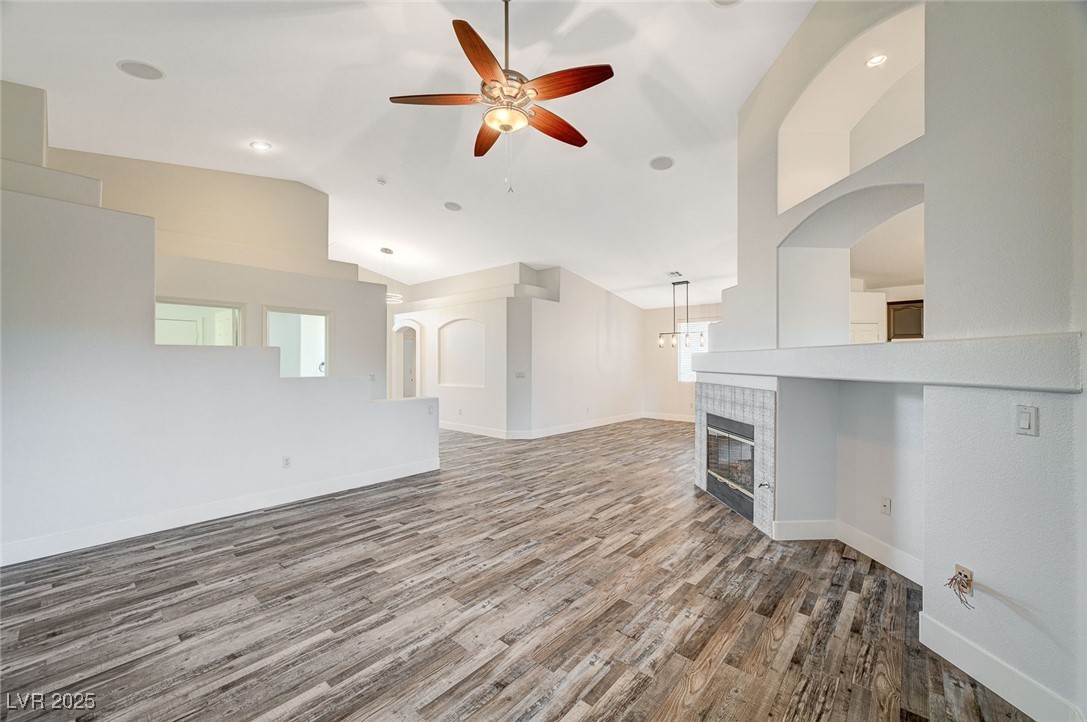1335 Rolling Sunset Street Henderson, NV 89052 - Photo 22 of 72 Unfurnished living room with baseboards, vaulted c
